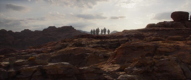 Still image featuring Mandalorians at a distance