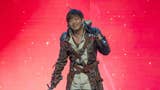 Naoki Yoshida in Viper cosplay onstage at Fan Fest