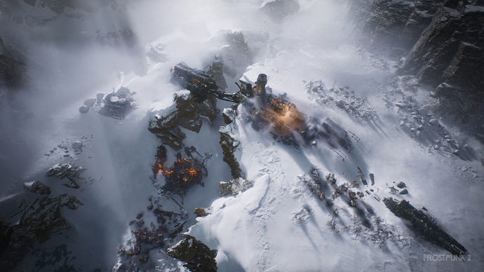 An overhead view of mechanical ruins peaking out from the snow in Frostpunk 2