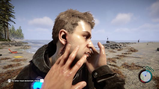 The player cradles the face of Kelvin on a beach in Sons Of The Forest