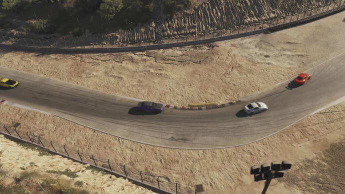 Forza Motorsport screenshot showing four cars turning a corner on a dusty track from birds-eye view