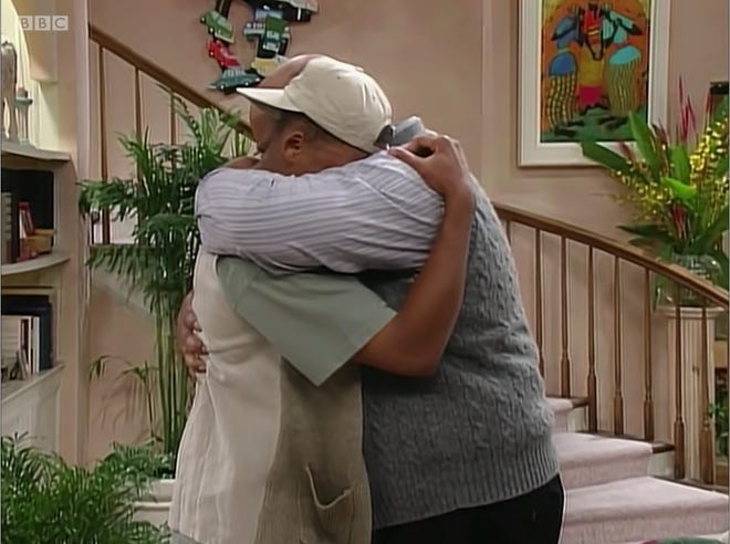 Still image of Will and Uncle Phil hugging