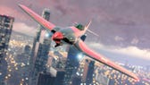 GTA Online, a red Buckingham Alpha-Z1 plane is flying over the city of Los Santos.