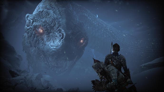 God of War Ragnarok review - Atreus looks up at the giant world snake