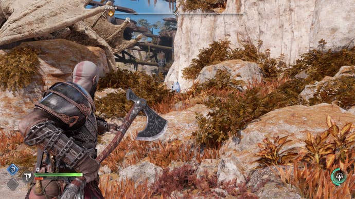 Kratos lines up a suitable vantage point to destroy the second idol statue on Dragon Beach in God of War Ragnarok