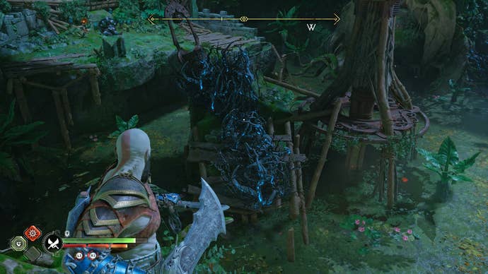 Kratos buring vines from around a crane in The Abandoned Village in God of War Ragnarok