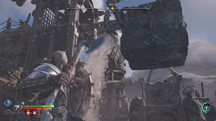 Kratos using his axe to lower a crane in God of War Ragnarok