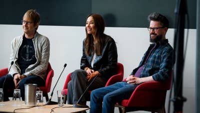 Mark Cerny, Jade Raymond, and Leon O'Reilly at a panel discussion