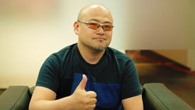 A photograph of PlatinumGames co-founder Hideki Kamiya, giving a thumbs-up
