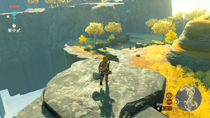 Link looking down from a rock on one of the sky islands in The Legend of Zelda: Tears of the Kingdom.