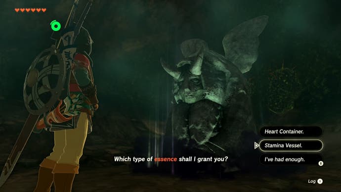 Link interacting with a statue at Looking Landing, which lets the player exchange heart containers for more stamina.