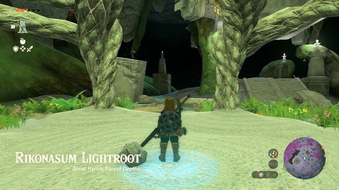 Link standing at the Rikonasum Lightroot in The Legend of Zelda: Tears of the Kingdom.