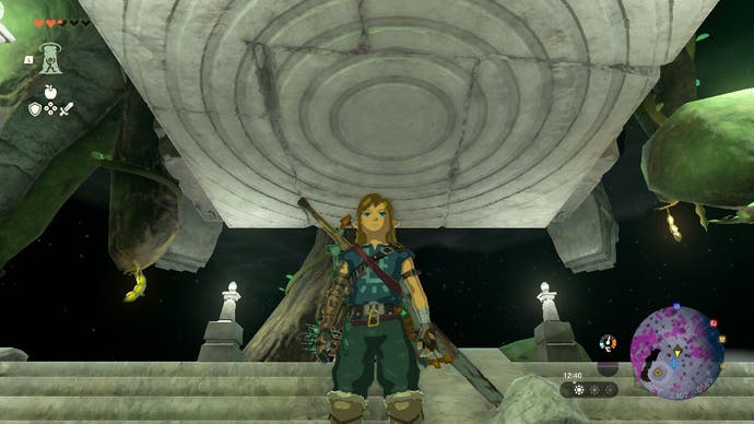 Link standing underneath a large stone platform which leads towards the Korok Forest.