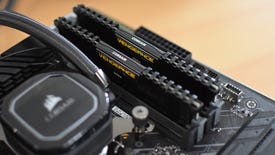 Two sticks of newly installed RAM inside their motherboard slots.