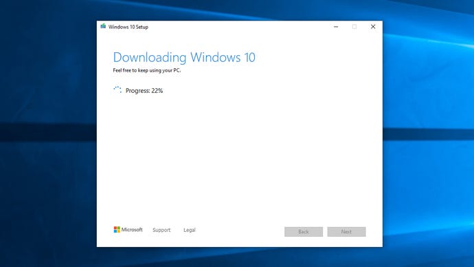 Step 5 of how to create Windows 10 installation media: wait for the tool to download and install Windows 10 files, then click 'Finish'.