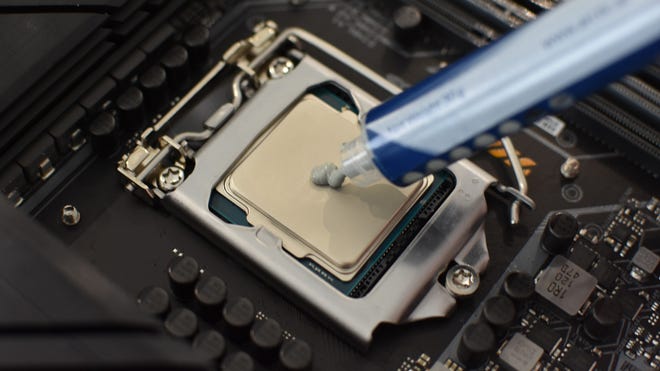  apply thermal paste to the middle of the CPU.