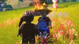 cropped view of talking to lego hayseed in fortnite lego while standing in front of a campfire in a grassy area