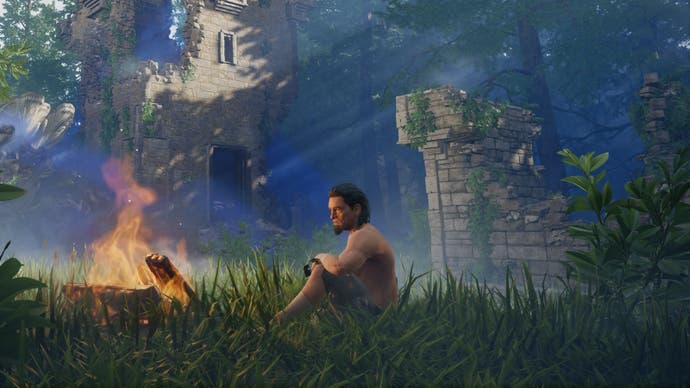 A lone, shirtless male figure sitting near a lit campfire in an Enshrouded ruin.