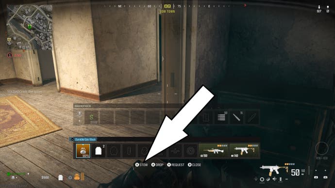 a white arrow pointing to the option to display a gas mask inside a house on the map of Urzikstan
