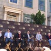 Photograph of speakers at TCM event