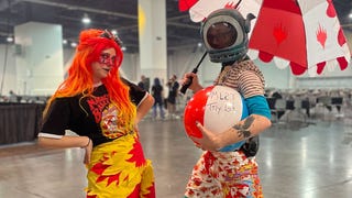 Cropped photo of two cosplayers