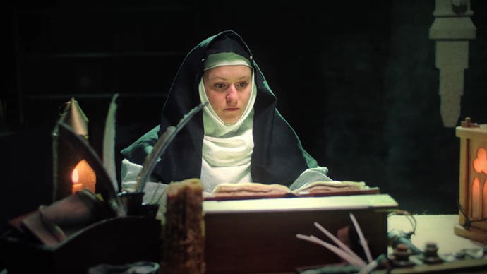 Ikulinati review - a live-action nun writing in a book
