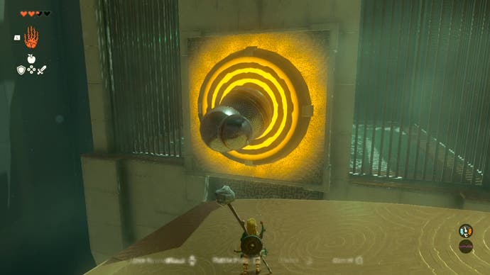Link using the Ultrahand ability to drop three, large metal balls that have been fused together into a target in the Iun-orok Shrine.