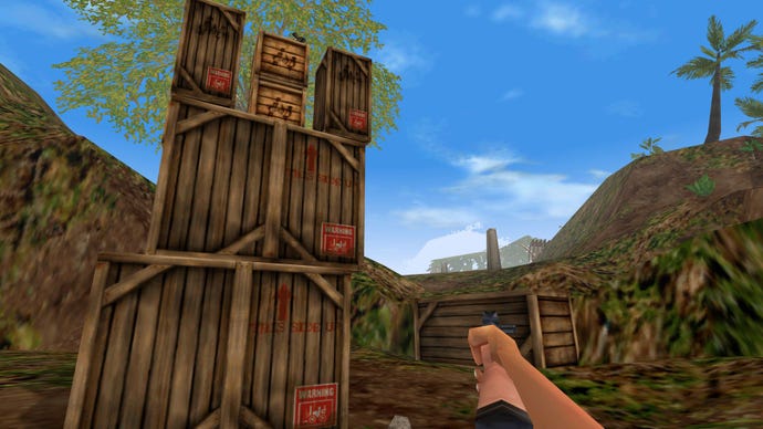 The player looking at a puzzle in Jurassic Park Trespasser, comprised of stacking many crates