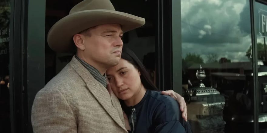 Killers of the Flower Moon still image featuring DiCaprio and Gladstone