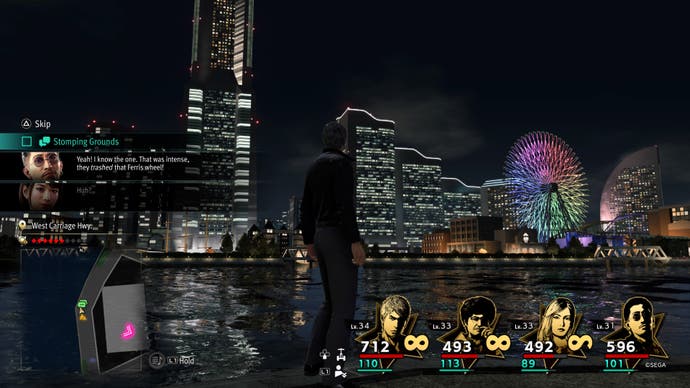 Screenshot from Like A Dragon: Infinite Wealth, showing an over-the-shoulder view of the city lights and ferris wheel.