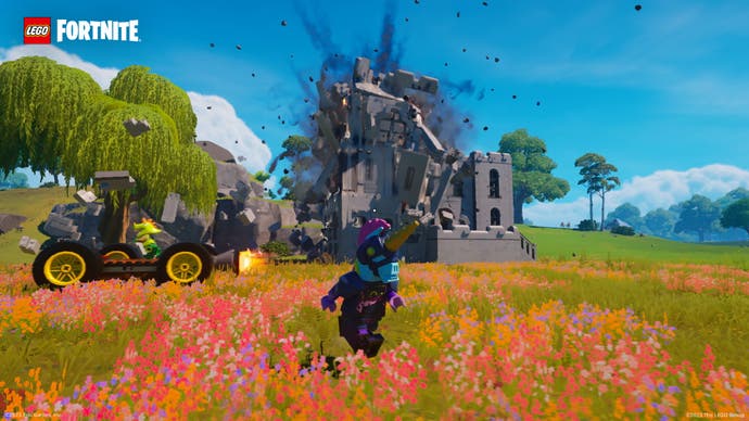 A Lego Fortnite screenshot shows a building collapsing after exploding.