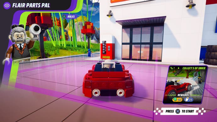 Lego 2K Drive review screenshot, showing a red sports car, parked outside a white house, starting a mission for another monkey mechanic.