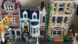 A set of modular Lego buildings clipped together: a bookshop next to a blue and white townhouse, next to a thin purple donut shop, next to a large police station