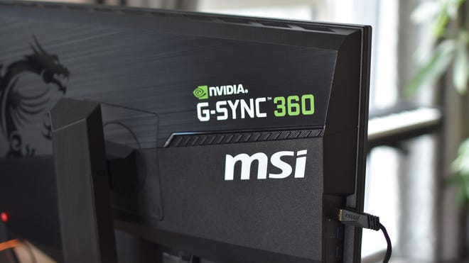 The MSI and Nvidia decals on the rear of the MSI Oculux NXG253R gaming monitor.