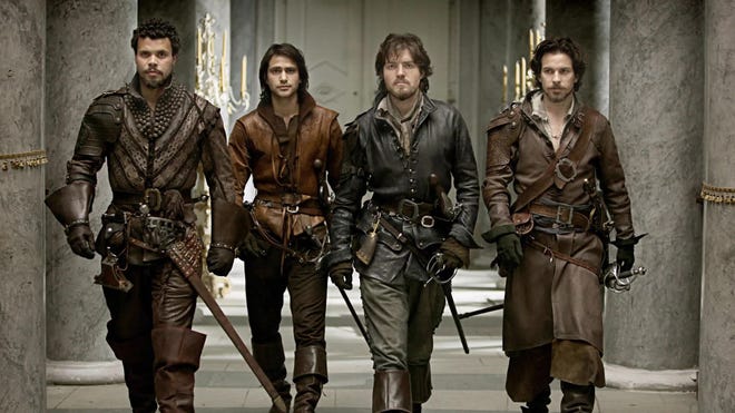 Promotional image featuring the three Musketeers and D'artagnan