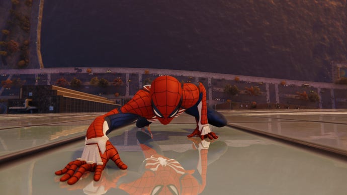 Spider-Man climbs the outside of a skyscraper in Marvel's Spider-Man Remastered.