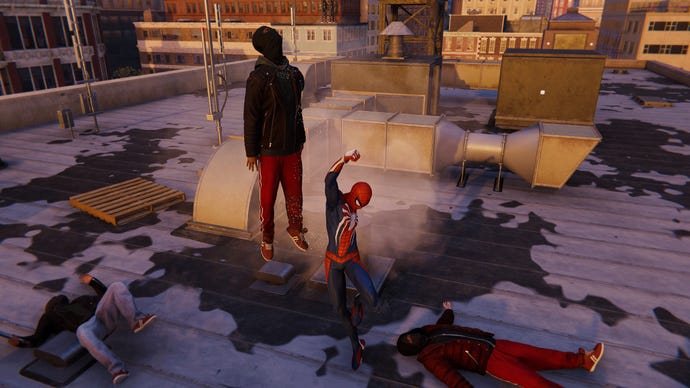 Spider-Man uppercuts a thug in Marvel's Spider-Man Remastered.
