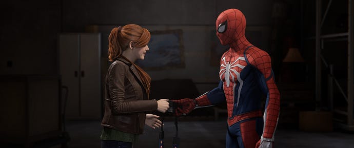 Spider-Man hands Mary Jane Watson her camera in Marvel's Spider-Man Remastered.