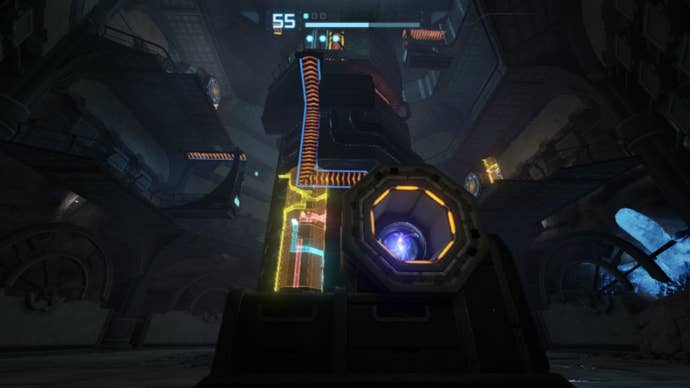 The morph ball is in the slot for a spider track puzzle in Metroid Prime Remastered