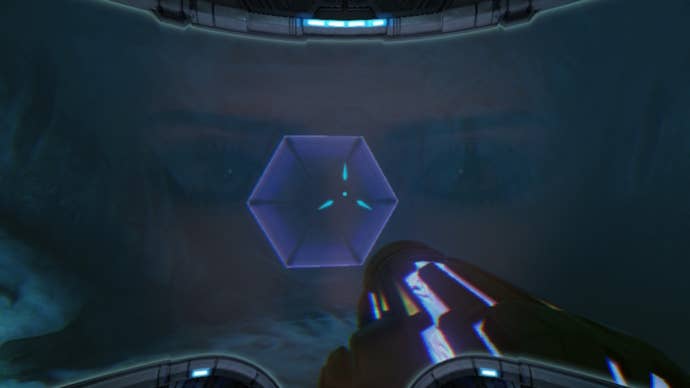 Samus faces an underwater wave beam door in Metroid Prime Remastered