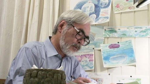 Hayao Miyazaki at his desk working