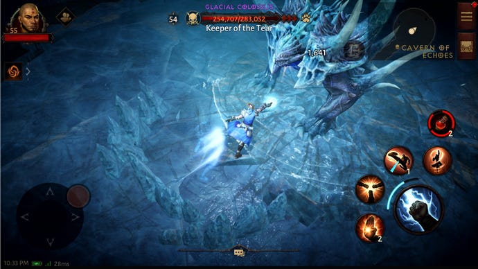 Diablo Immortal Monk in a cave of ice fighting a boss named the Glacial Colossus with blue magic