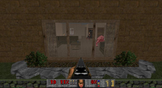 Looking through a window in MyHouse.wad, a DOOM mod, and seeing demons wandering around inside
