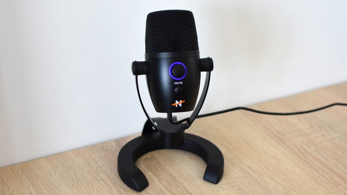 The Neat Bumblebee II gaming microphone on a desk.