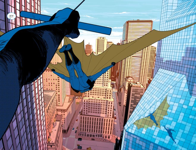 Nightwing and Batgirl swing through Bludhaven
