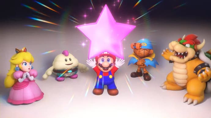 Super Mario RPG  - Mario holds up a star while Peach, Mallow, Geno and Bowser look on.