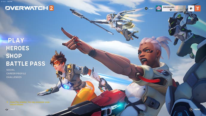 Overwatch 2 review header - the heroic start menu screen of characters staring into the distance