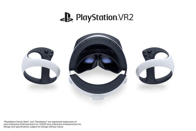 PSVR2 review - a view of the headset and two controllers either side, from behind the headset looking into the goggles