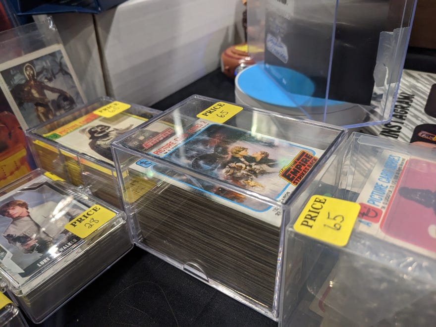 Photograph of plastic cases filled with Star Wars collectable cards