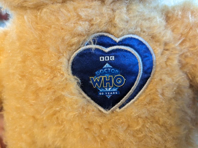 Photograph of bear with two Doctor Who hearts